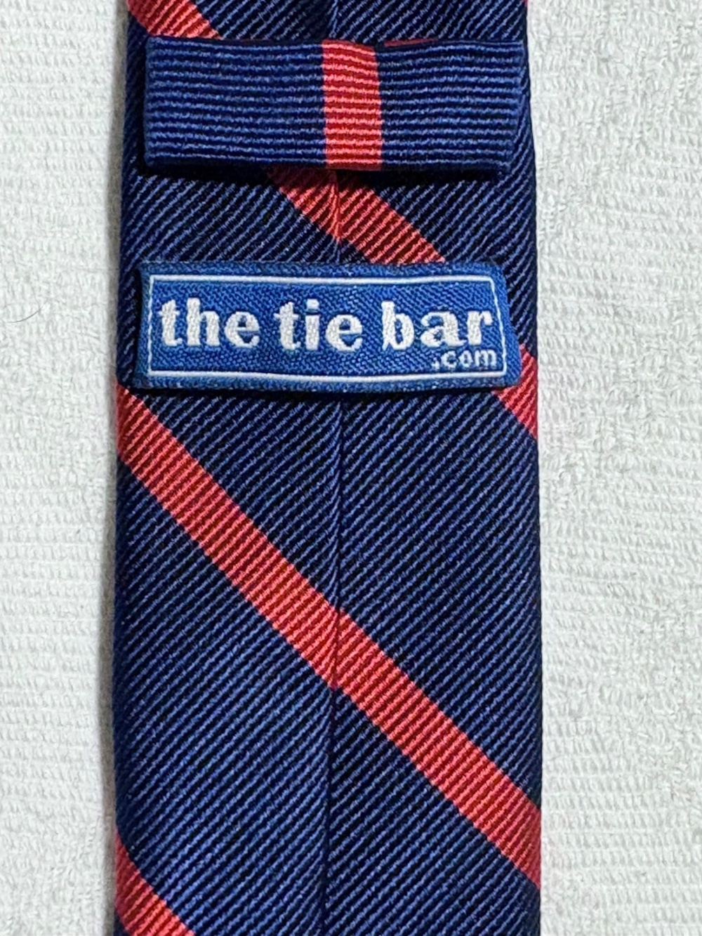 The Tie Bar Navy Blue & Red Diagonal Striped Skinny Necktie 2”